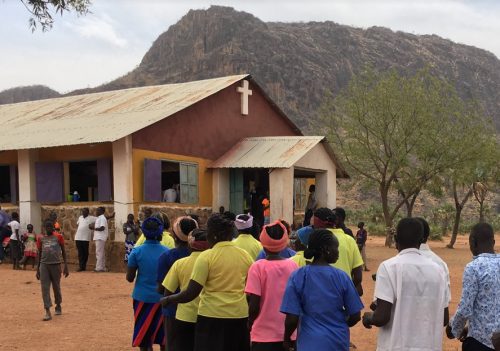 Members of the Nuba Mountain community preparing for worship