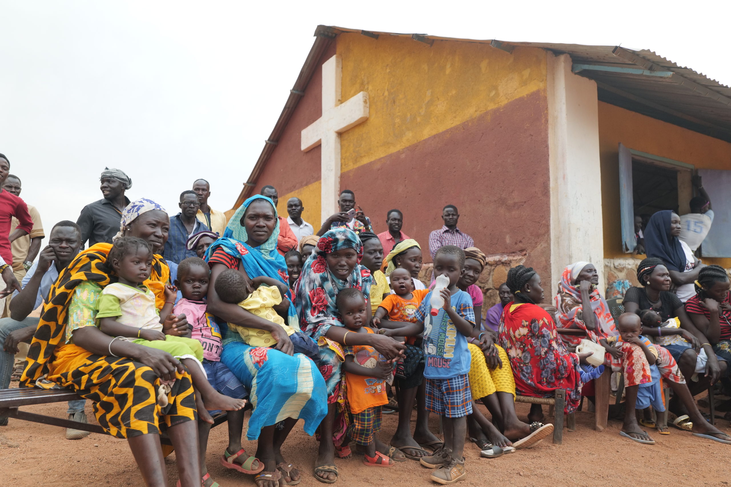 People of Nuba Mountains in front of church Source: Ernie Didot, March 2020